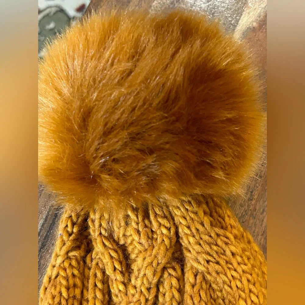 Free People-Pinnacle Pompom
Beanie NWT Mustard color with Pompon
(New) - Picture 6 of 7